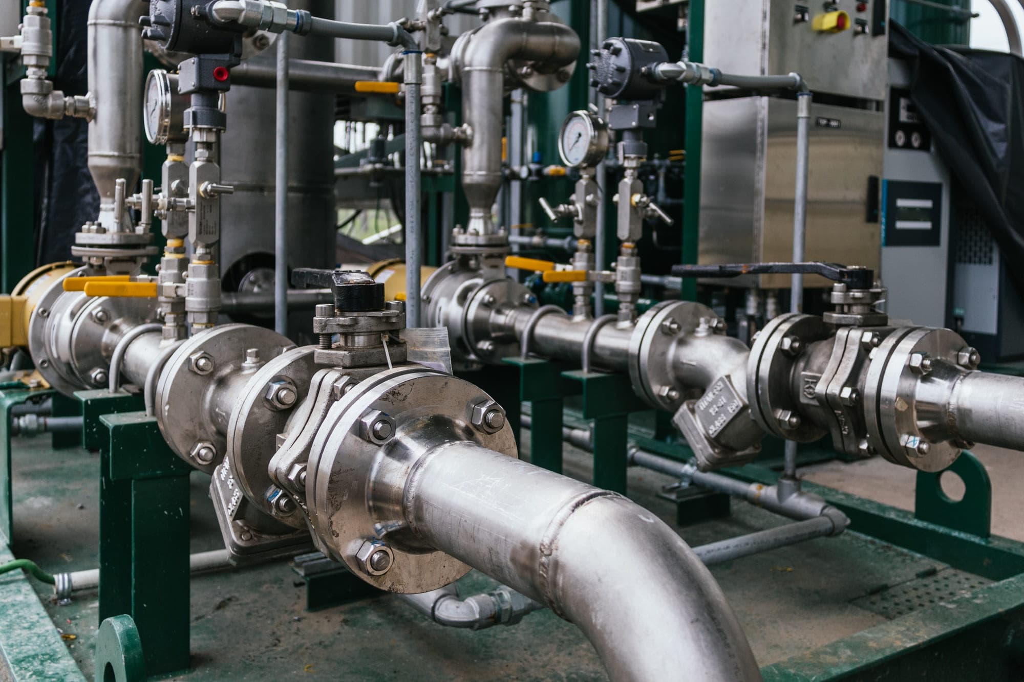 Industrial technician overseeing factory production